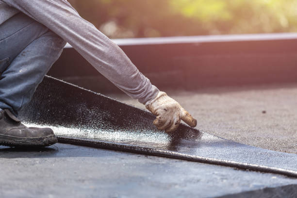 Professional Waterproofing technician working in Springville, AL
